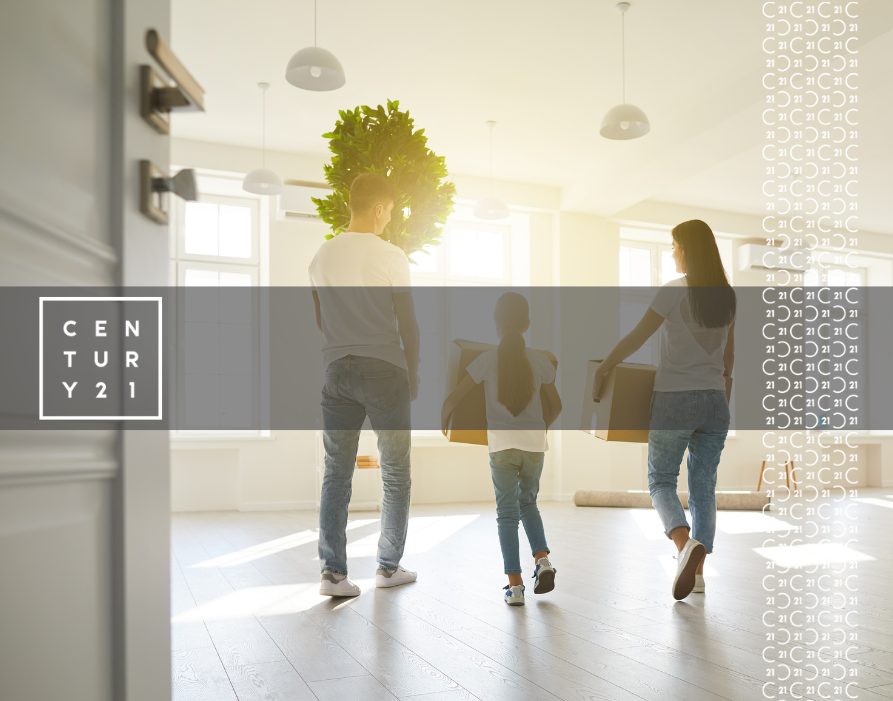 Happy-Family-with-Children-Moving-with-Boxes-in-a-New-Apartment-House.-Back-View-1 (2)